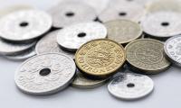 Mønter på et bord i danske kroner 
